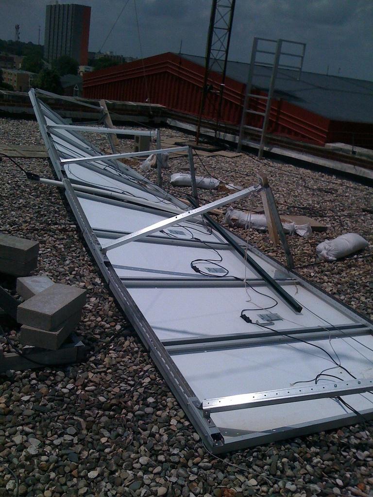 /wp-content/uploads/2012/03/solar_panels_storm_broken.jpg