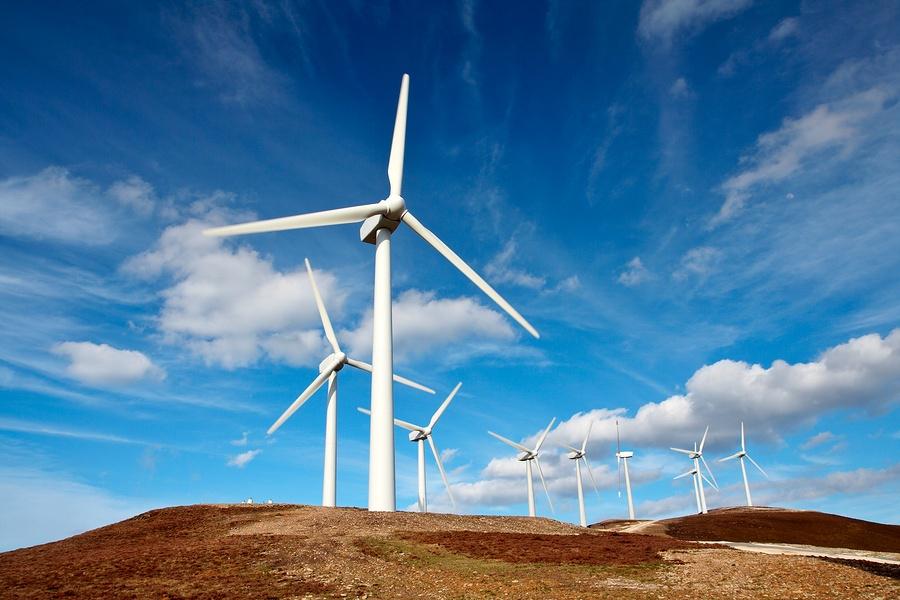 /wp-content/uploads/2014/06/bigstockphoto_Wind_Turbines_Farm_517044.jpg